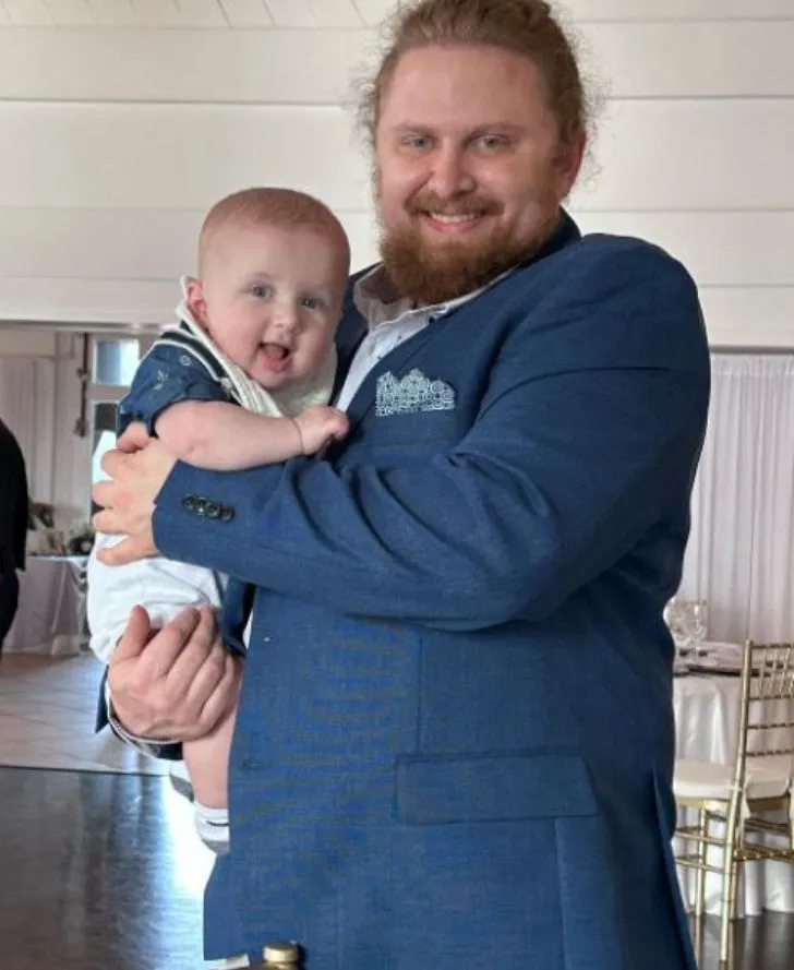 Connor Bird with his child